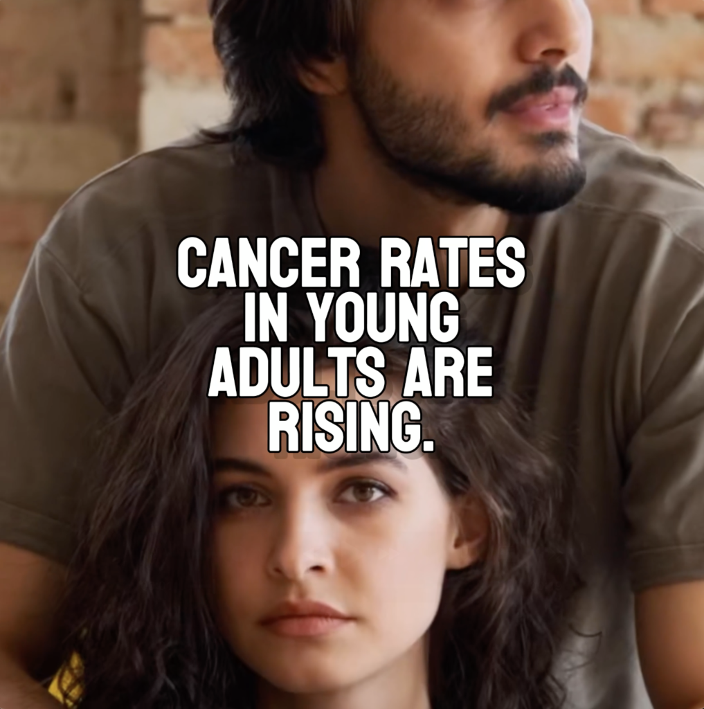A young couple stands in an intimate embrace. The man looks into the distance with a solemn expression, while the woman holds his hands over her shoulders and stares directly into the camera. The overlay text highlights the rising cancer risk among young adults.